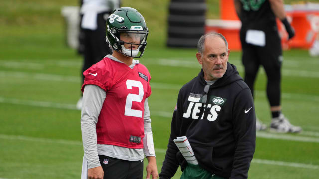 New York Jets quarterback Zach Wilson (2) and offensive line coach John Benton during a practice.